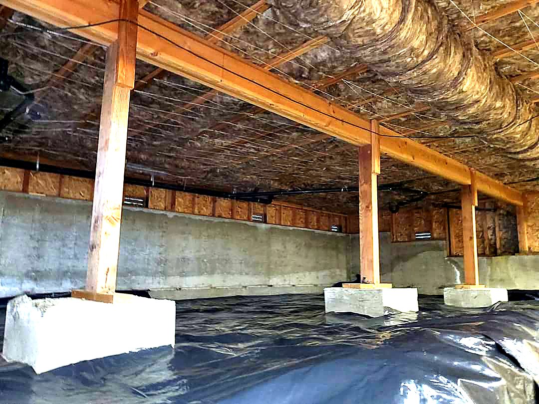 Ground cover laid over bare crawl space soil
