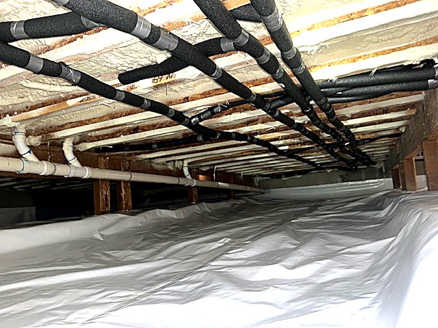 Joist bays stripped and ready for new insulation
