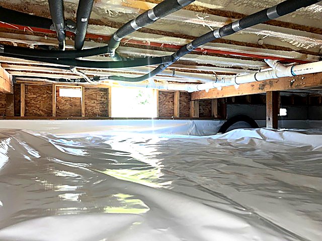 Vapor barrier lapped and sealed at the stem wall