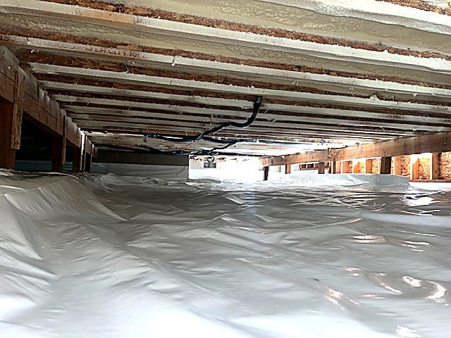 Insulation installed tight to the subfloor