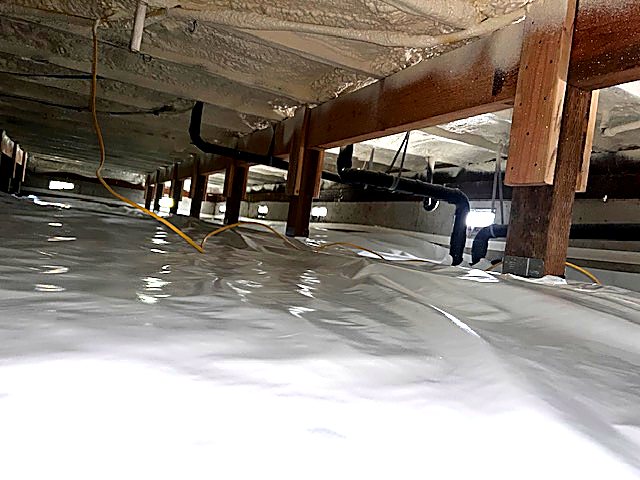 Crawl space insulation around plumbing and ducting