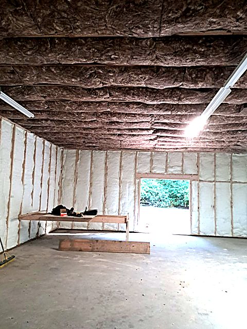 Bare joists after a full insulation clean-out