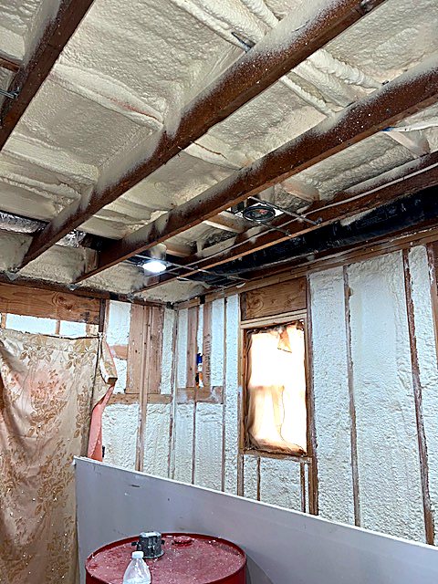 Insulated interior wall with new sheathing