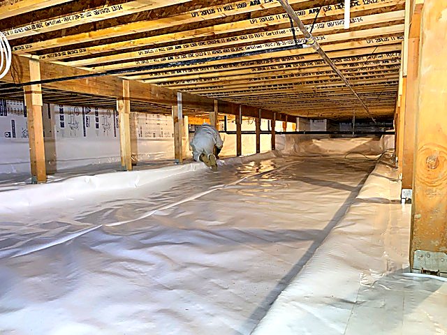 Post pads and vapor barrier detailed around the perimeter