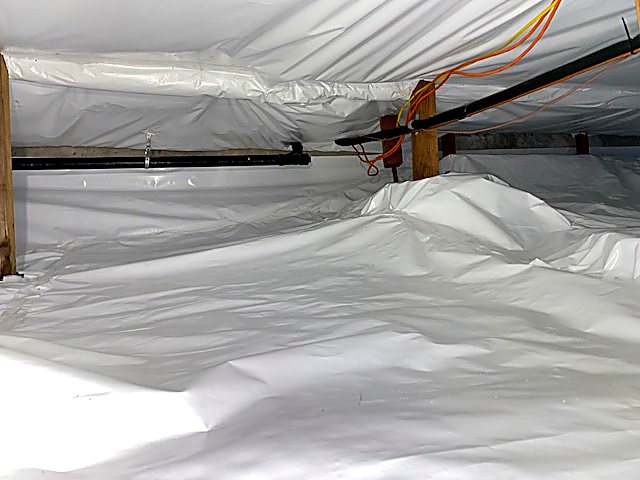 Crawl space finished with new batt insulation